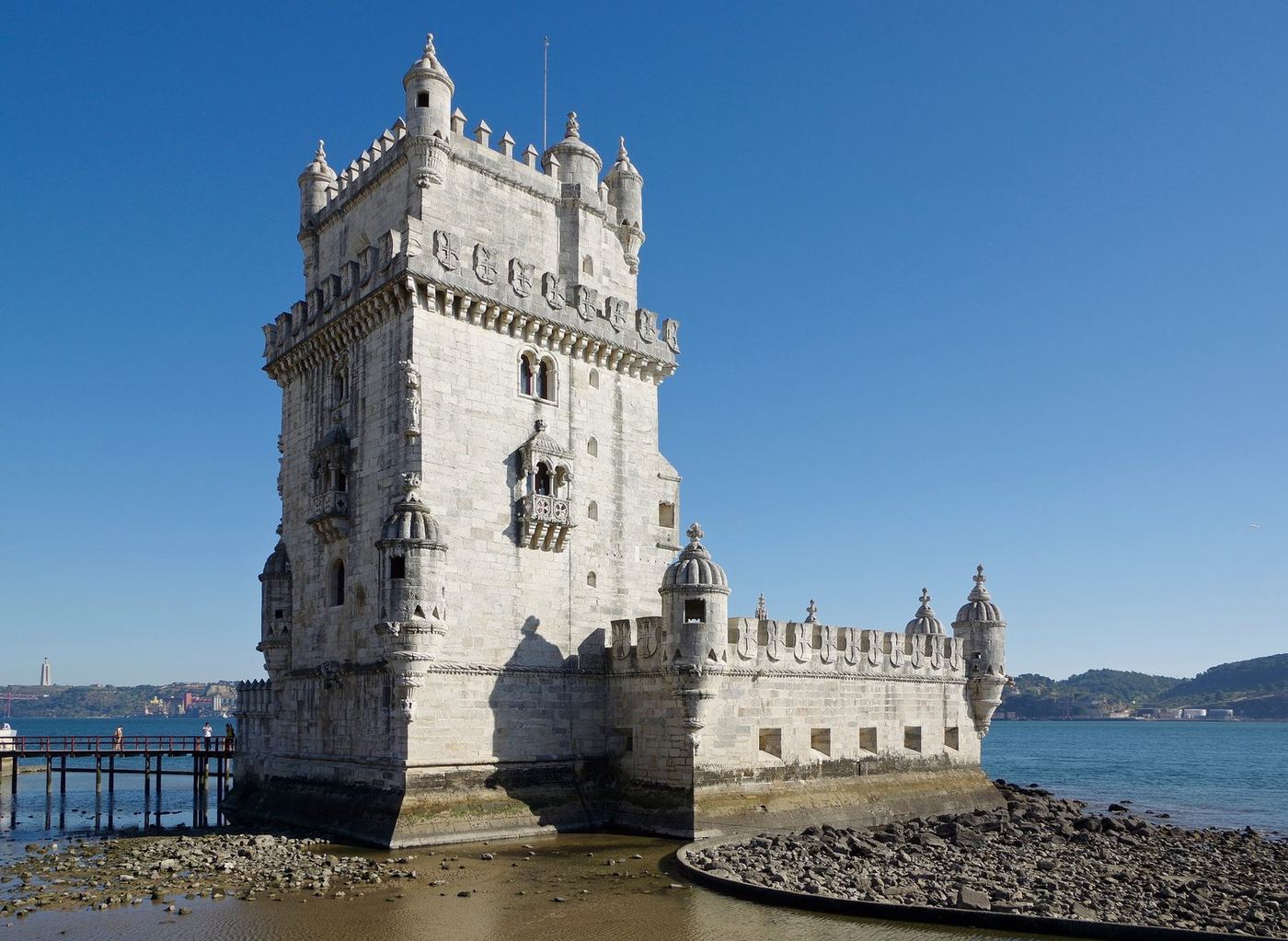 Belém Tower stands in the river